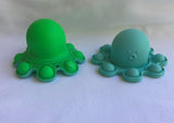 Octopus Poppers reversible mood octopus fidget sensory toy aqua green