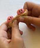 Peanut keychain with 2 cute peanuts inside squeeze to make them pop out attach to your bag sensory fidget toy