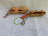 Peanut keychain with 2 cute peanuts inside squeeze to make them pop out attach to your bag sensory fidget toy size comparsion