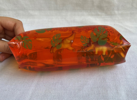 Jumbo Dinosaur Watersnake fidget toy amber