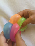 Set of 4 glow in the dark colourful sticky splat balls soft sensory fidget toy