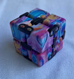 Infinity Cubes silent pocket sized fidget toy rainbow disco
