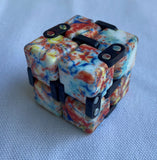 Infinity Cubes silent pocket sized fidget toy splatter
