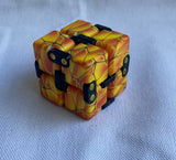Infinity Cubes silent pocket sized fidget toy orange dragon scale