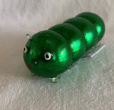 Green squidgy disco caterpillar. Sensory fidget toys