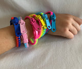 Set of 6 Zipper Bracelets flat lay sensory fidget toy